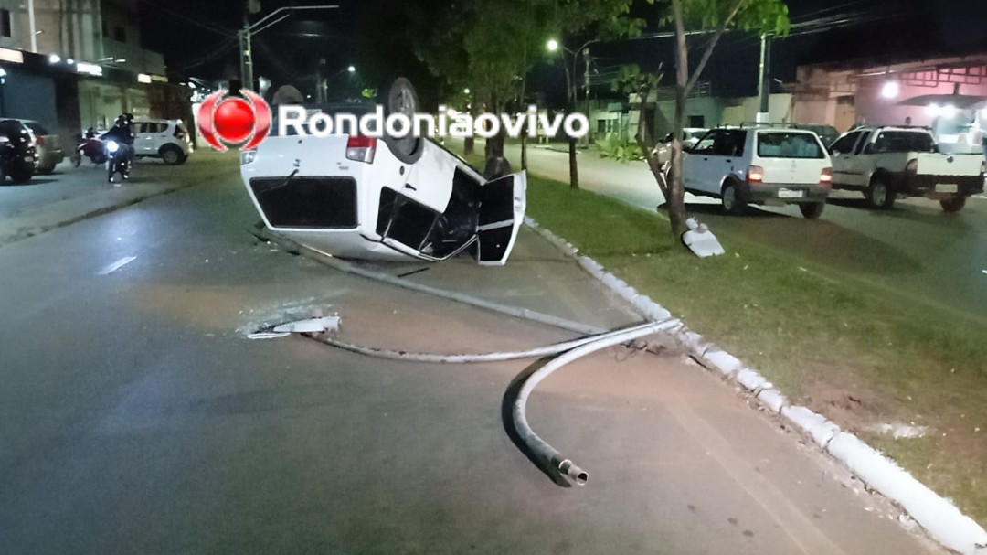 NA GUAPORÉ: Carro Uno capota e derruba poste em grave acidente 