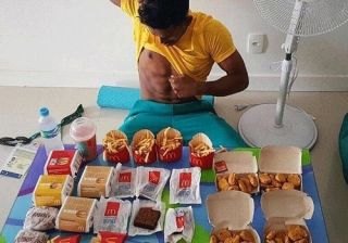 Comida da Vila não agrada e atletas vivem à base de nuggets e fast food
