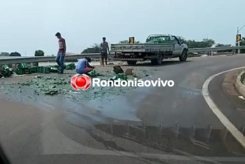 CENA DA CIDADE: Carga de cerveja Heineken fica espalhada no viaduto após cair de caminhão